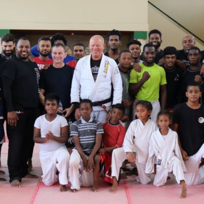 Brazilian Jiu Jitsu Black Belt Dave Mark (Center) visiting from Canada, to his right wrestling coach Darek Wasowicz of Poland and event organizer John Ramirez of T&T Budokai, together with participants of the 